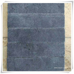 Tumbled black basalt paving tiles